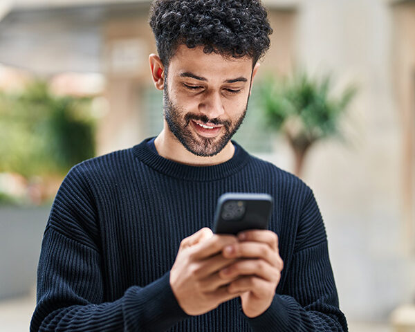 Young man on his smart phone.