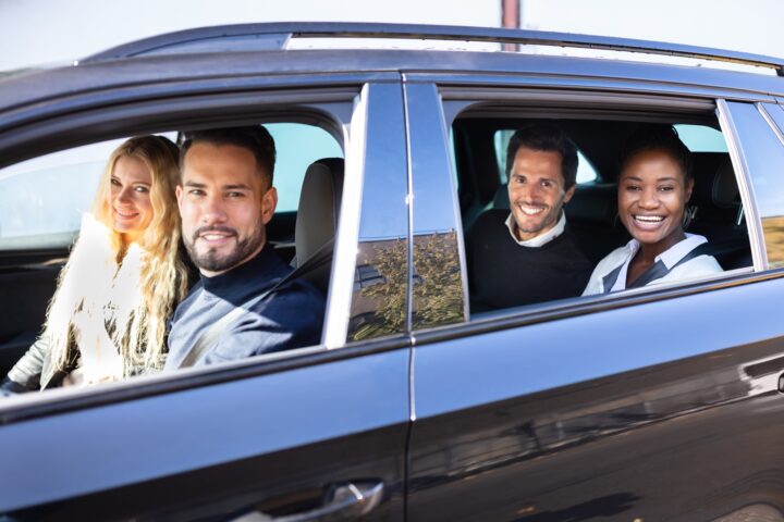 Business people in the car as a carpool